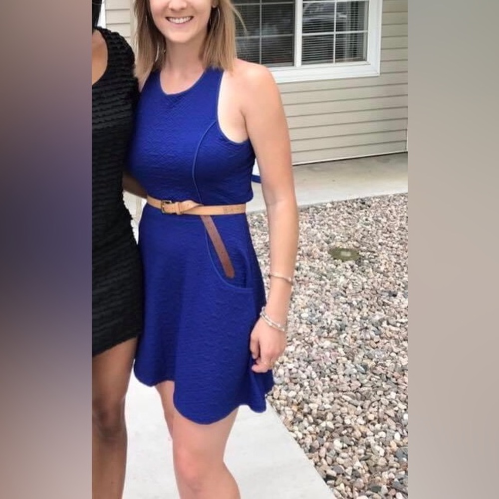Blue sleeveless skater dress criss cross back detail with pockets